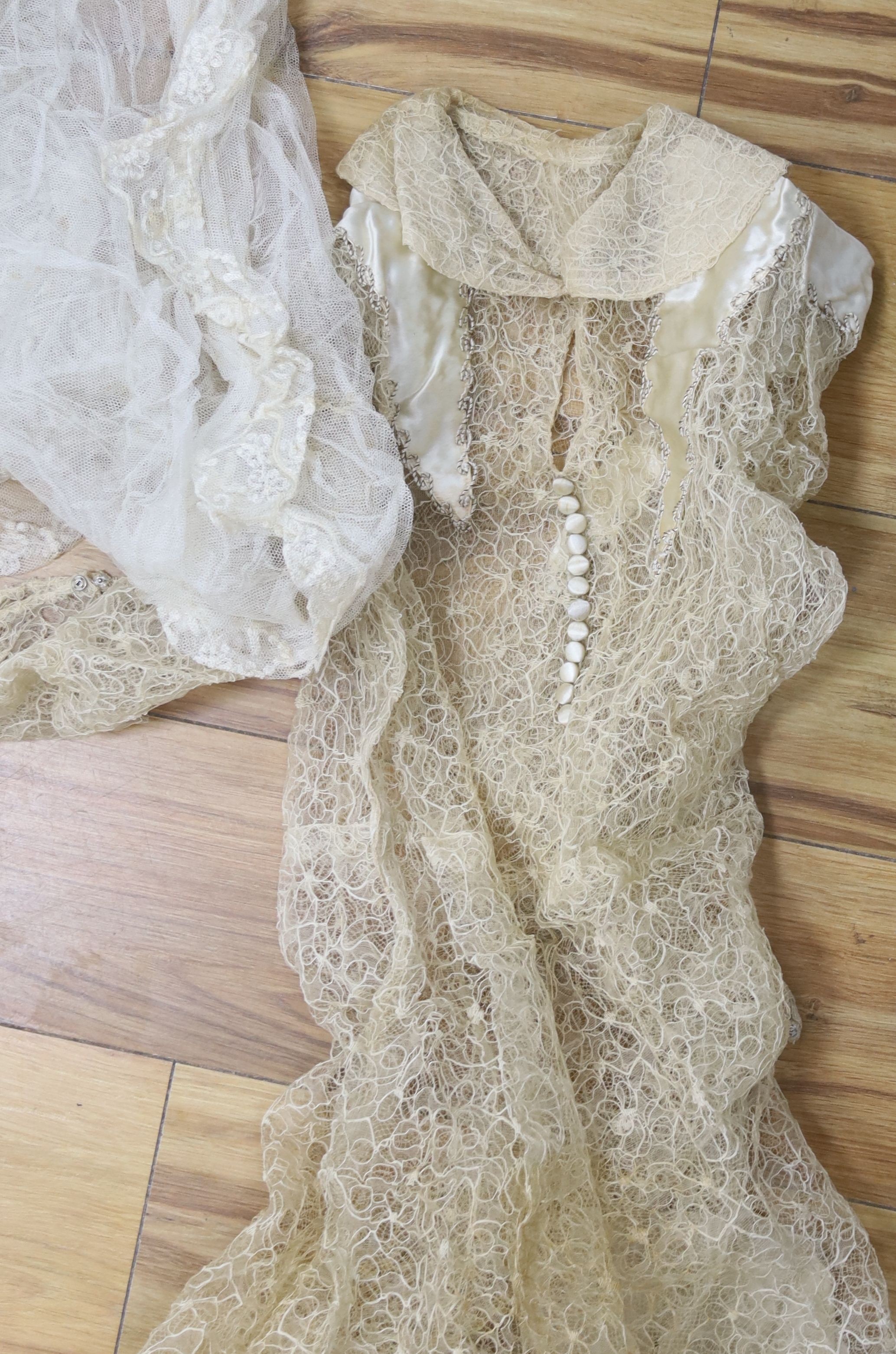 A 1930's lace and satin wedding dress including net veil